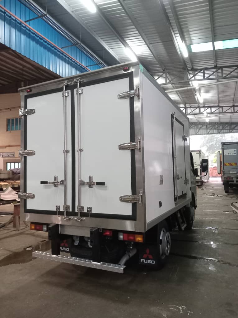 White box body with twin rear doors on a Mitsubishi Fuso truck in the workshop