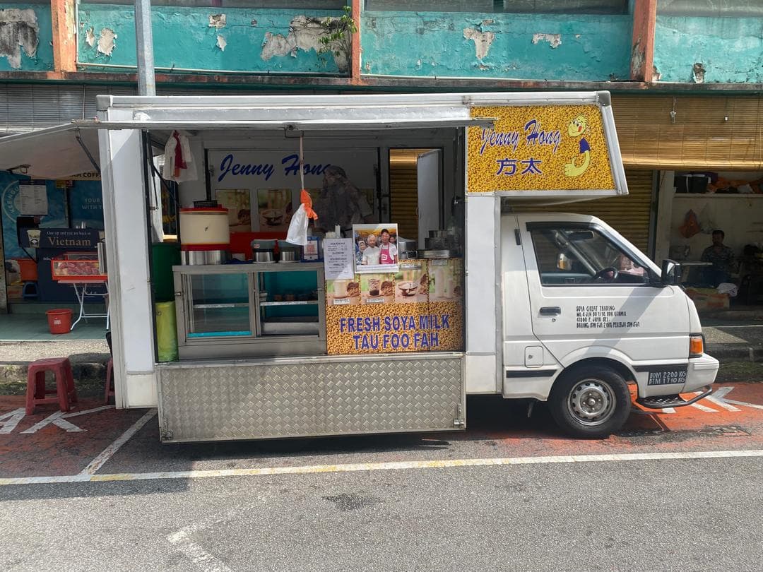Van converted into a roadside food stall with its serving counter open